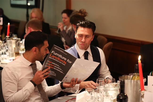 Caridon boys browsing our Event Brochure of the night