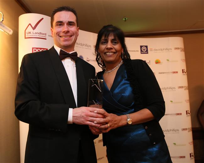 Hasmita Reardon from Reardon Properties accepts Make a Difference Award sponsored and presented by Robert Hunter (Director, Place Group UK