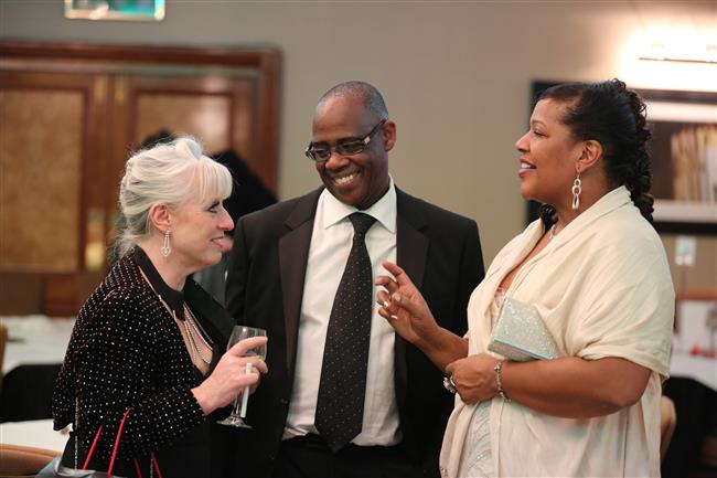 Maxine, Debbie and guest having sharing a laugh