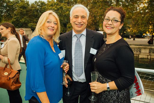 Guests enjoying themselves at the drink reception